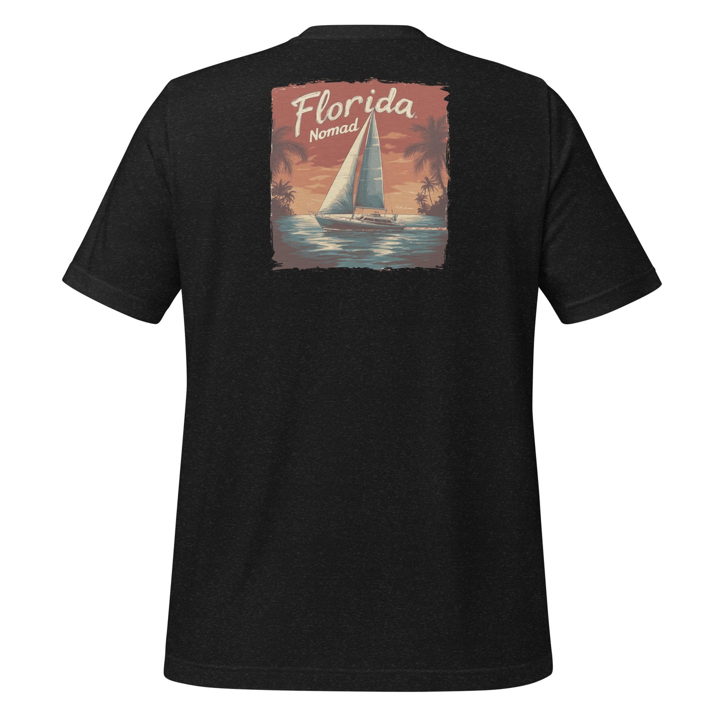 Black Florida Nomad t-shirt with a vintage sailboat design at sunset, reflecting tropical coastal vibes and ocean adventure.