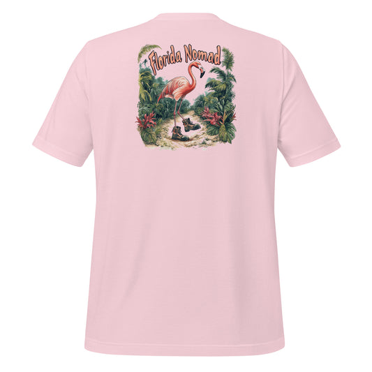 Pink Florida Nomad t-shirt design featuring a whimsical flamingo wearing hiking boots, walking through a tropical jungle trail